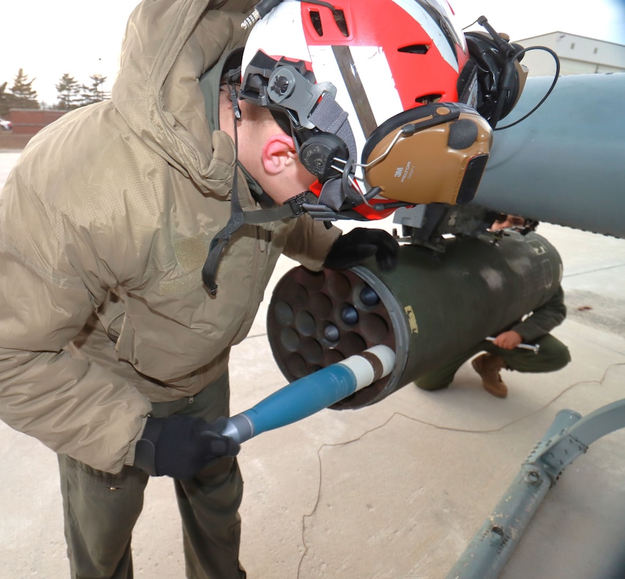 The Marine Light Attack Helicopter Squadron 773 (HMLA 773) ordinance team, uploads and arms a Cobra AHT-1Z and in preparation for day/night aerial gunnery missions with a full contingent of 40 mm rockets and 20mm gatling gun rounds at JB MDL. The squadron is based at Joint Base McGuire–Dix–Lakehurst, NJ and falls under the command of Marine Aircraft Group 49 (MAG-49).  (Images provided by the Fort DIX USASA Training Division / Steven Roussel)