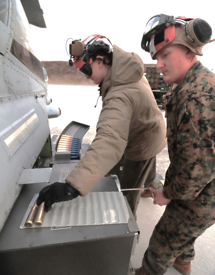The Marine Light Attack Helicopter Squadron 773 (HMLA 773) ordinance team, uploads and arms a Cobra AHT-1Z and in preparation for day/night aerial gunnery missions with a full contingent of 40 mm rockets and 20mm gatling gun rounds at JB MDL. The squadron is based at Joint Base McGuire–Dix–Lakehurst, NJ and falls under the command of Marine Aircraft Group 49 (MAG-49).  (Images provided by the Fort DIX USASA Training Division / Steven Roussel)