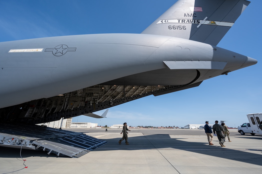 Airmen disembark an aircraft