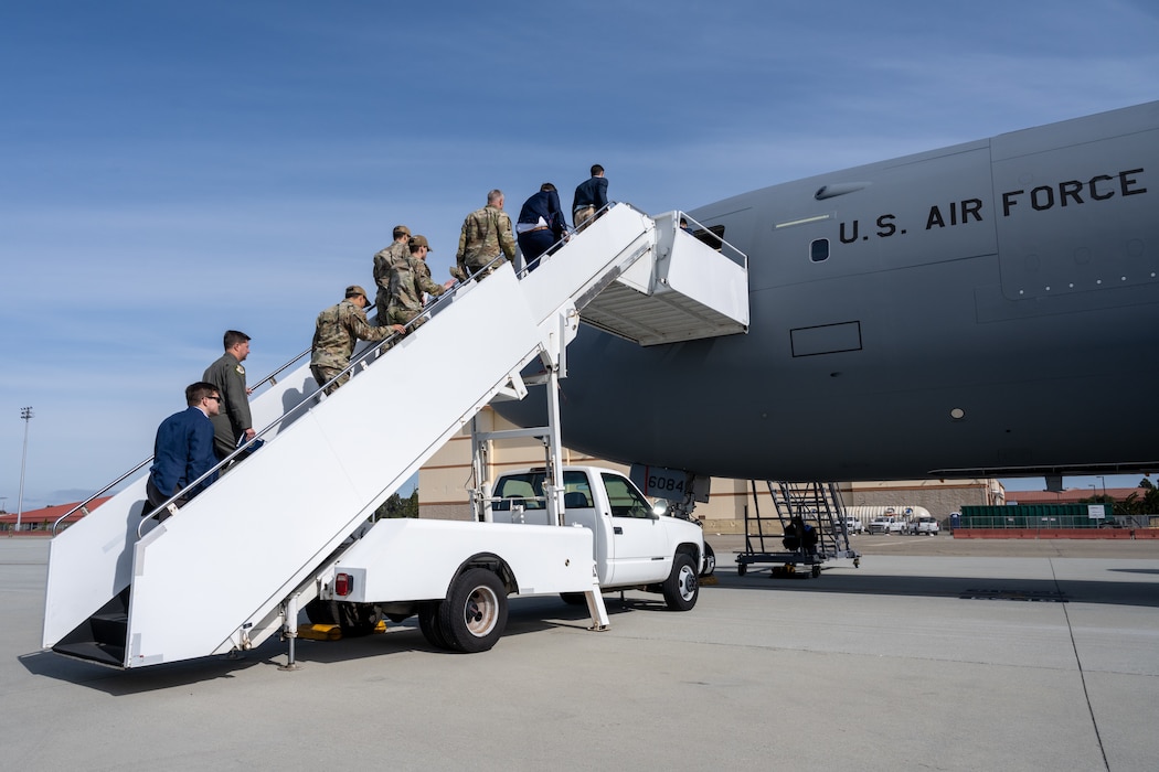 Airmen and staff delegates board KC-46 aircraft