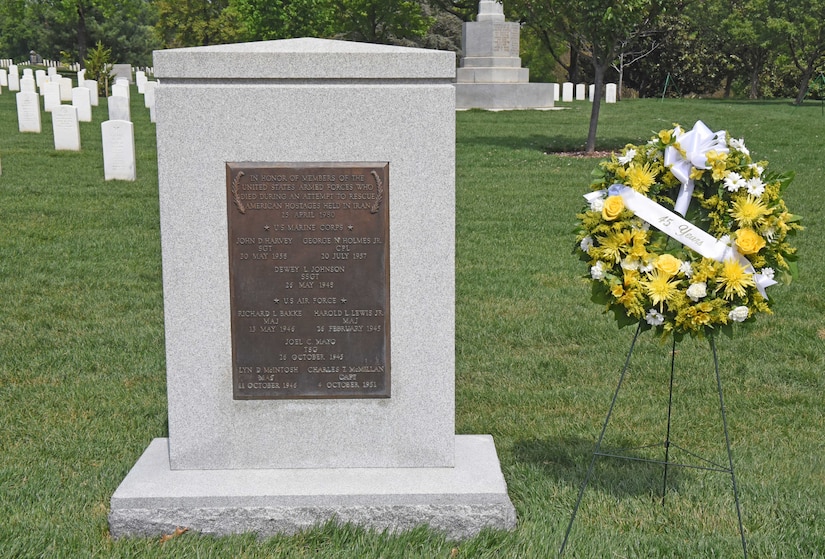 A marker is shown in a cemetery.