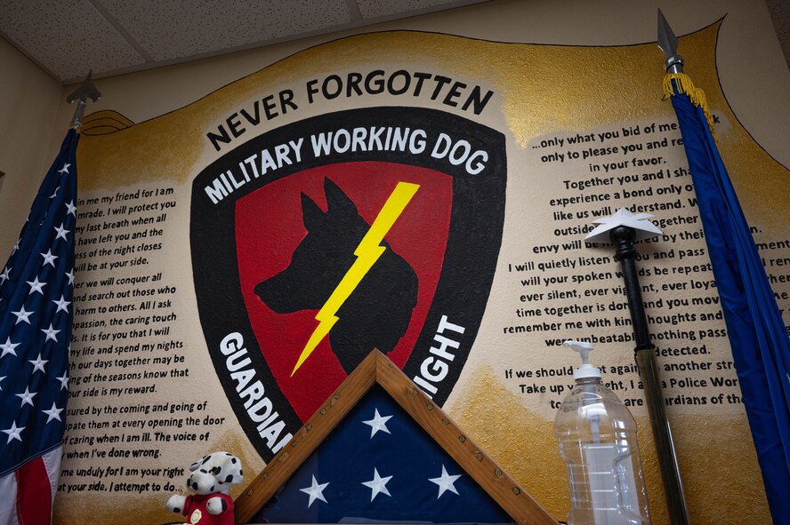 A mural is displayed in the 5th Security Forces Squadron military working dog kennels at Minot Air Force Base, North Dakota, April 21, 2025. The 5SFS’s military working dogs are trained to support a variety of operations, including drug detection, explosive ordnance detection and security patrols. (U.S. Air Force photo by Senior Airman Kyle Wilson)