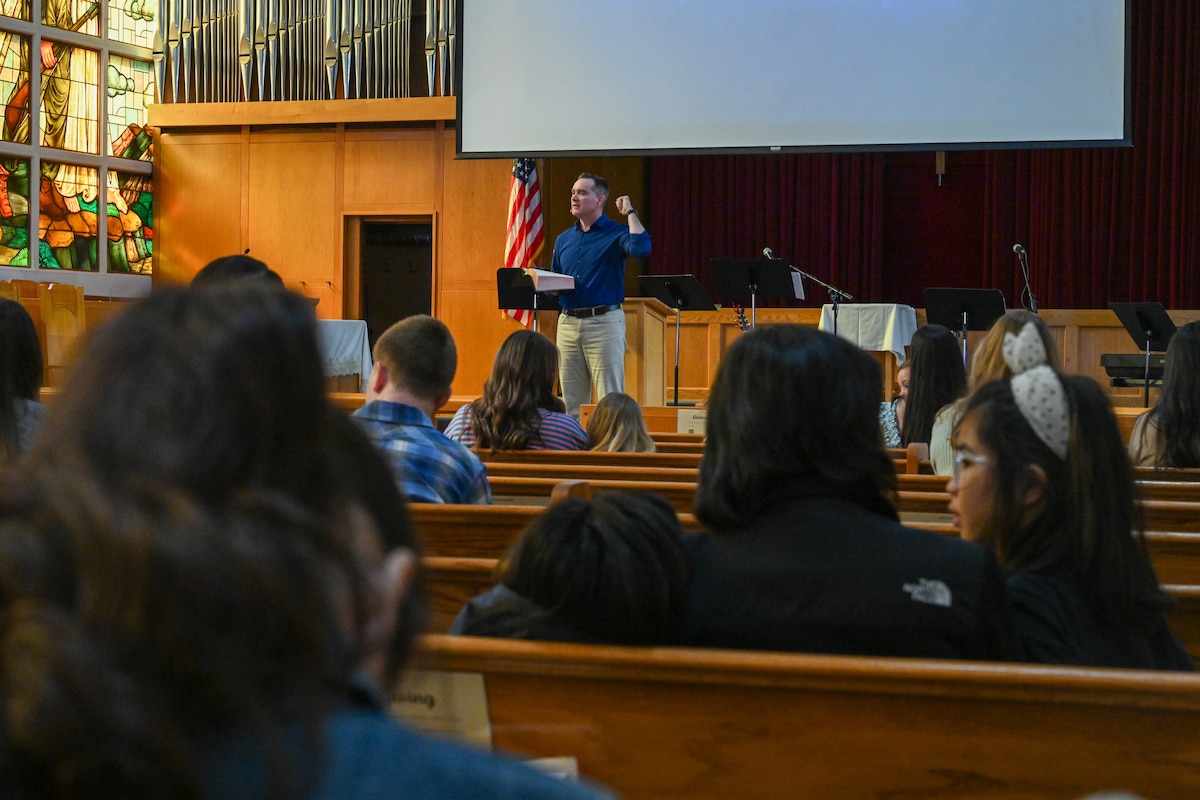 Service members, families and civilians at Joint Base Elmendorf-Richardson gather on Easter Sunday at the Arctic Warrior Chapel. At JBER, chaplains and religious support teams organized multiple services, prayer groups and community gatherings throughout the week to accommodate the diverse Christian population on base. (U.S. Air Force photo by Airman 1st Class Eli A. Rose)
