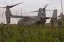 Australian soldiers with 5th/7th Battalion Royal Australian Regiment step off an MV-22B Osprey with Marine Medium Tiltrotor Squadron 364, 3rd Marine Aircraft Wing, during an air insert from Puerto Princesa, Palawan, Philippines, to Rizal in support of Exercise Balikatan 25, April 23, 2025.