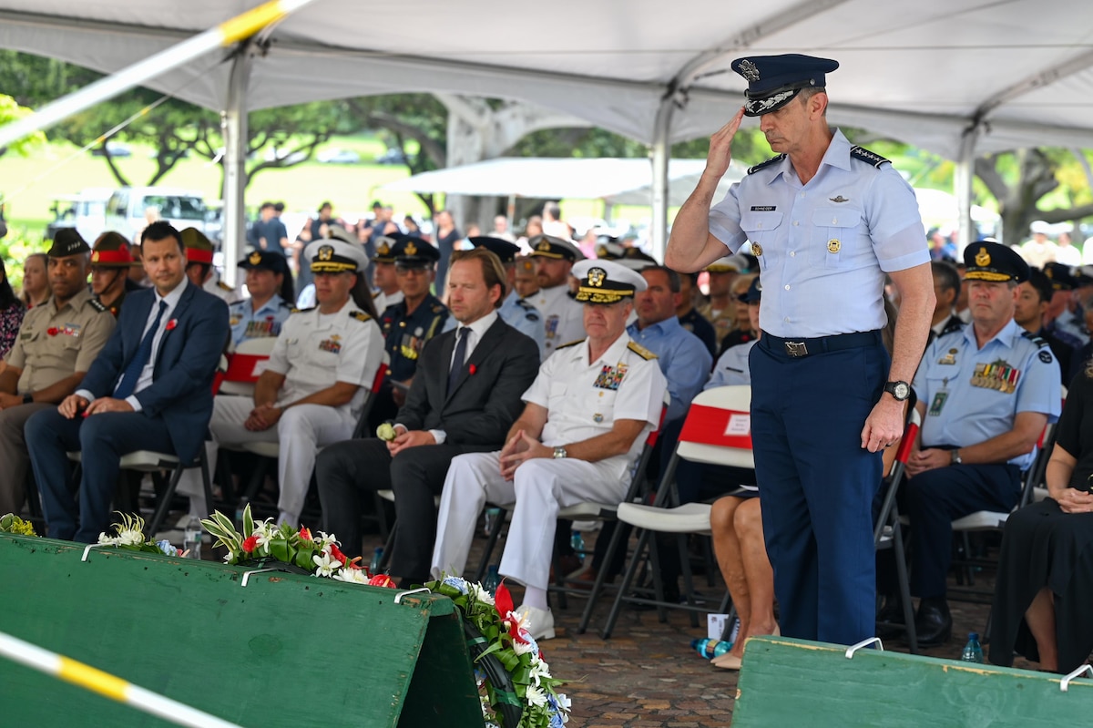 U.S. Air Force Gen. Kevin B. Schneider, Pacific Air Forces commander, salutes during the Australian and New Zealand Army Corps Day ceremony at the National Memorial Cemetery of the Pacific, Honolulu, Hawaii, April 25, 2025. ANZAC Day commemorates the landing at Gallipoli in 1915 and honors all who have served since. (U.S. Air Force photo by Senior Airman Melody Bordeaux)