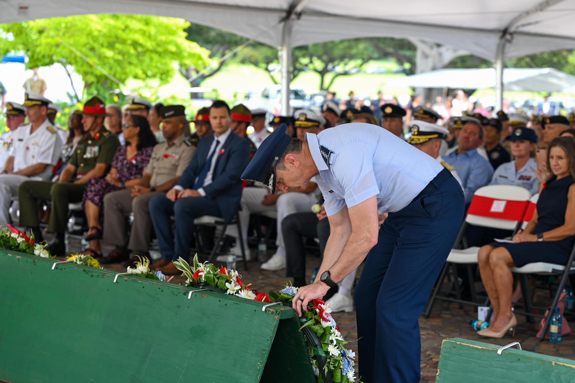U.S. Air Force Gen. Kevin B. Schneider, Pacific Air Forces commander, lays a wreath during the Australian and New Zealand Army Corps Day ceremony at the National Memorial Cemetery of the Pacific, Honolulu, Hawaii, April 25, 2025. ANZAC Day honors the sacrifices of Australian and New Zealand forces during all wars, conflicts and peacekeeping operations. (U.S. Air Force photo by Senior Airman Melody Bordeaux)