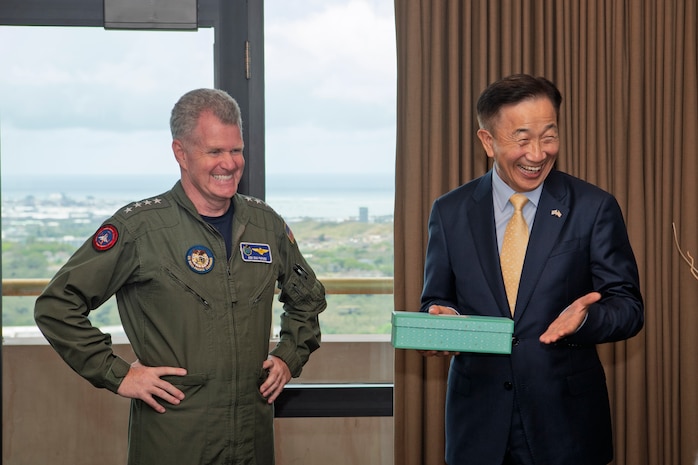 Adm. Samuel J. Paparo, commander of U.S. Indo-Pacific Command, receives a gift from Republic of Korea Consul General Lee, Seo Young and the Consular Corps of Hawaii during a working lunch to connect with USINDOPACOM leadership and J5 foreign area officers at USINDOPACOM headquarters, Honolulu, Hawaii, April 22, 2025. USINDOPACOM is committed to enhancing stability in the Indo-Pacific region by promoting security cooperation, encouraging peaceful development, responding to contingencies, deterring aggression and, when necessary, prevailing in conflict. (U.S. Army photo by Sgt. Austin Riel)