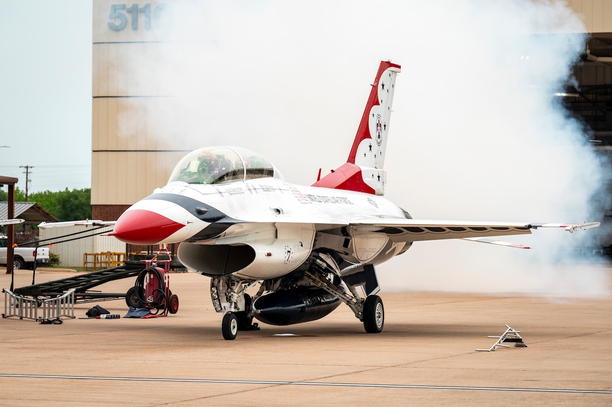 U.S. Air Force Lt. Col. Taylor Wight, Thunderbird Seven, Director of Operations for the U.S. Air Force Air Demonstration Squadron "Thunderbirds", and Cari Selzer, Hometown Hero participant, taxi down the runway during an incentive flight at Dyess Air Force Base, Texas, April 18, 2025. Selzer has dedicated her time and skills to international medical missions, both in Kenya and the Philippines, providing essential care and education to hundreds in need. (U.S. Air Force photo by Staff Sgt. Leon Redfern)