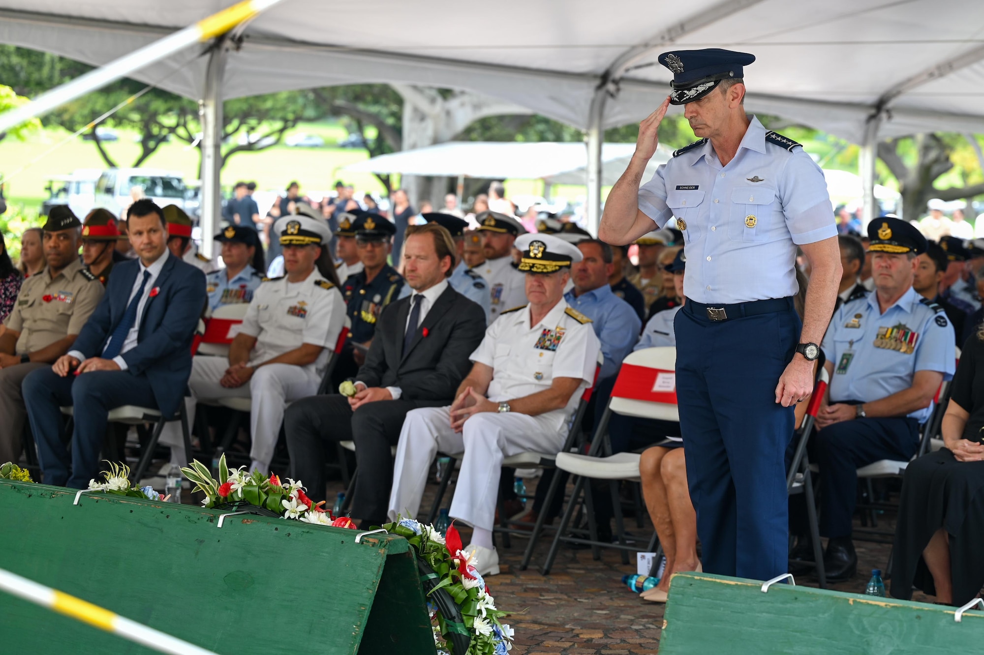 U.S. Air Force Gen. Kevin B. Schneider, Pacific Air Forces commander, salutes during the Australian and New Zealand Army Corps Day ceremony at the National Memorial Cemetery of the Pacific, Honolulu, Hawaii, April 25, 2025. ANZAC Day commemorates the landing at Gallipoli in 1915 and honors all who have served since. (U.S. Air Force photo by Senior Airman Melody Bordeaux)