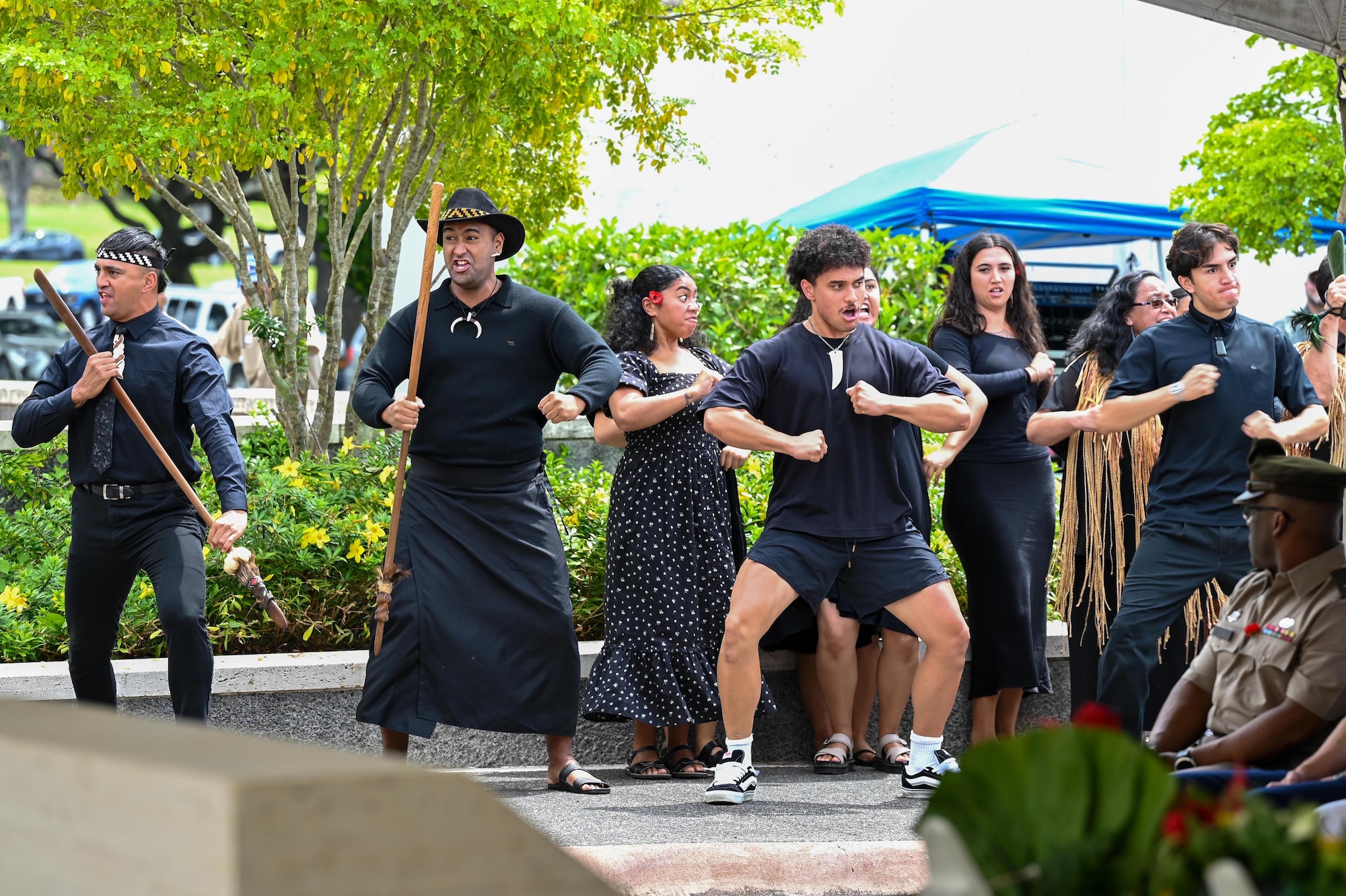 A group performs a haka in honor of Australian and New Zealand Army Corps Day at the National Memorial Cemetery of the Pacific, Honolulu, Hawaii, April 25, 2025. The haka is a ceremonial Māori war dance or challenge usually performed in a group representing a tribe's pride, strength and unity. (U.S. Air Force photo by Senior Airman Melody Bordeaux)