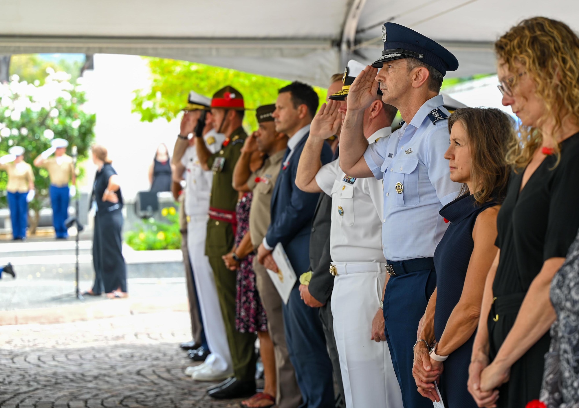 U.S. Air Force Gen. Kevin B. Schneider, Pacific Air Forces commander, salutes during the Australian and New Zealand Army Corps Day ceremony at the National Memorial Cemetery of the Pacific, Honolulu, Hawaii, April 25, 2025. ANZAC Day commemorates the landing at Gallipoli in 1915 and honors all who have served since. (U.S. Air Force photo by Senior Airman Melody Bordeaux)