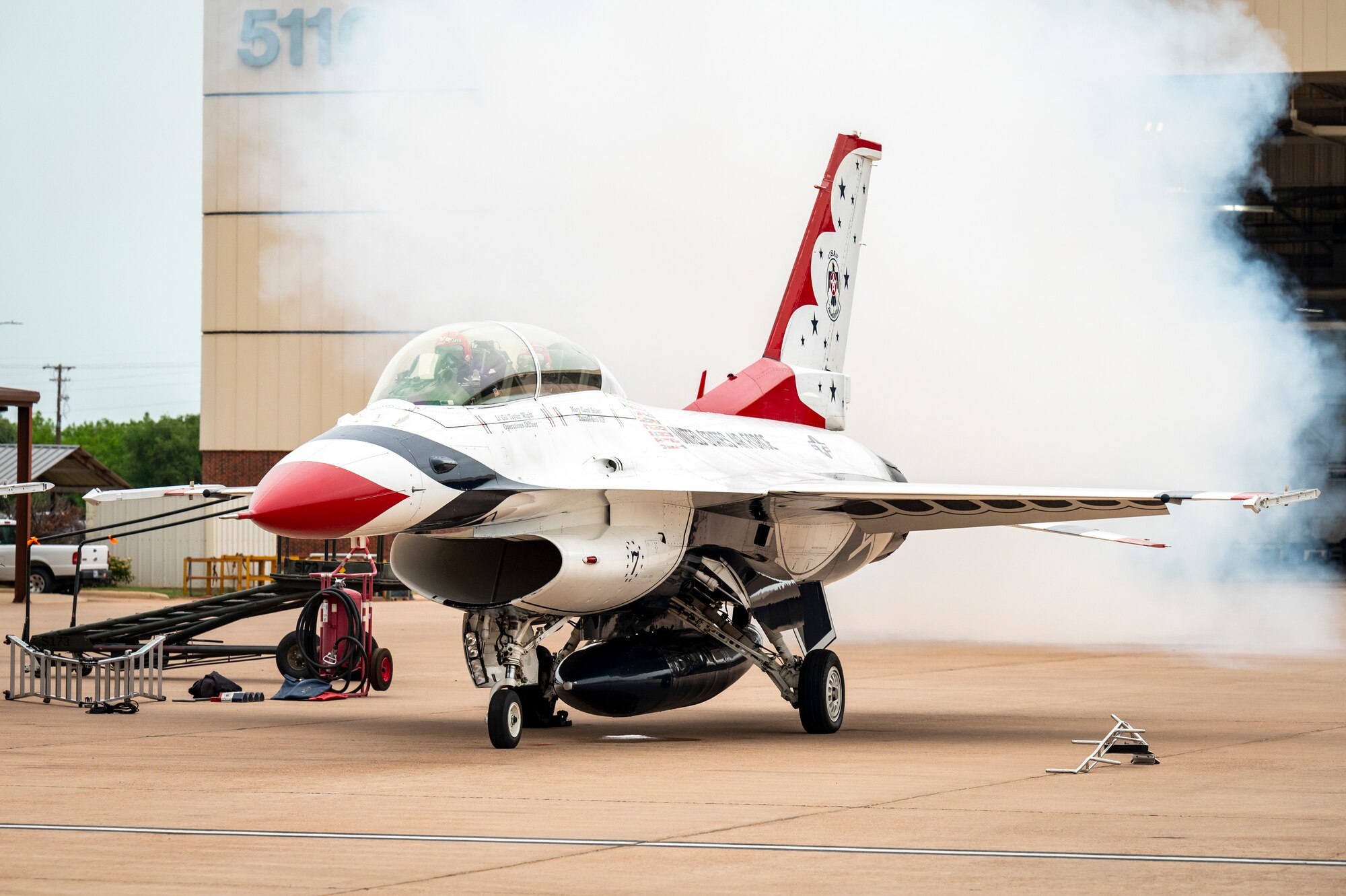 U.S. Air Force Lt. Col. Taylor Wight, Thunderbird Seven, Director of Operations for the U.S. Air Force Air Demonstration Squadron "Thunderbirds", and Cari Selzer, Hometown Hero participant, taxi down the runway during an incentive flight at Dyess Air Force Base, Texas, April 18, 2025. Selzer has dedicated her time and skills to international medical missions, both in Kenya and the Philippines, providing essential care and education to hundreds in need. (U.S. Air Force photo by Staff Sgt. Leon Redfern)