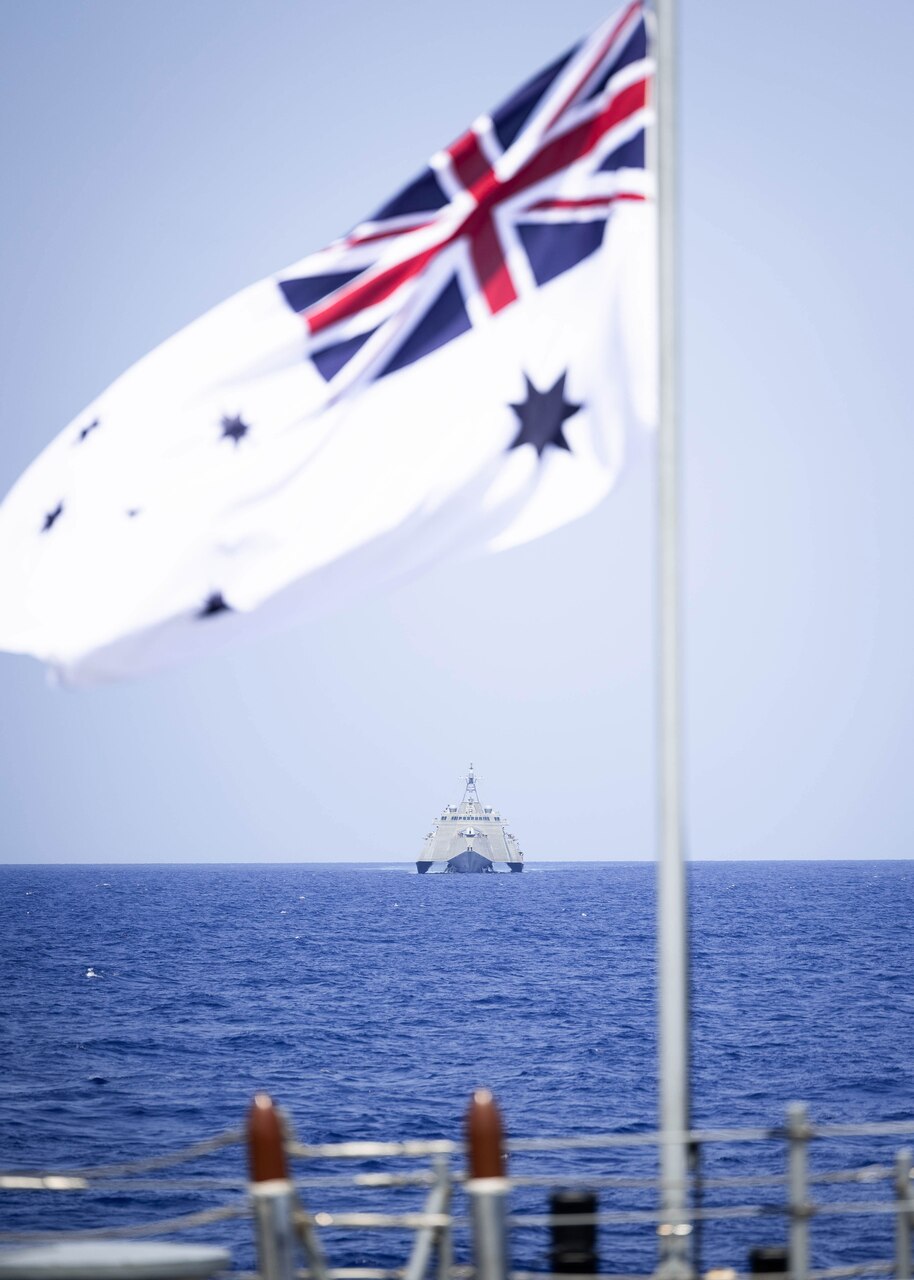 The Independence-variant littoral combat ship USS Omaha (LCS 12) steams with the Royal Australian Navy Hobart-class guided-missile destroyer HMAS Sydney (DDG 42) in the South China Sea, April 25, 2025.