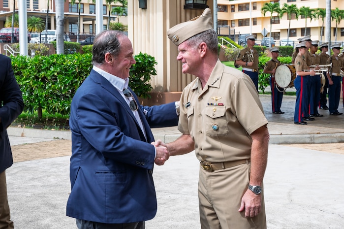 Adm. Samuel Paparo, commander, U.S. Indo-Pacific Command, hosts an Honors ceremony for U.S. Secretary of the Navy John Phelan, welcoming him to the USINDOPACOM headquarters at Camp H.M. Smith, Honolulu on April 25, 2025. Phelan received a briefing from INDOPACOM leaders on critical operational and logistical challenges experienced in the Indo-Pacific. USINDOPACOM is committed to enhancing stability in the Indo-Pacific region by promoting security cooperation, encouraging peaceful development, responding to contingencies, deterring aggression and, when necessary, prevailing in conflict. (U.S. Army Photo by Sgt. Austin Riel)