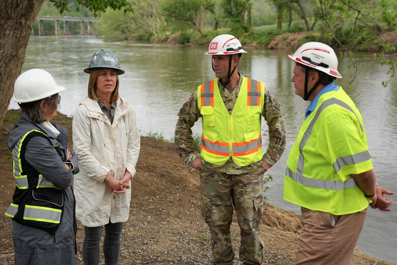 From left to right, Director of Governor Josh Stein’s Western Office Holly Jones, Ashville Mayor Esther Manheimer, U.S. Army Corps of Engineers Wilmington District Commander Col. Brad Morgan, and Acting Assistant Secretary of the Army for Civil Works E. Lee Forsgren, discuss waterway debris removal efforts at Hominy Creek Park in Asheville, North Carolina, April 24, 2025. The visit highlighted how USACE is working alongside local and federal partners to clear waterways and reduce environmental and public safety risks following Hurricane Helene.