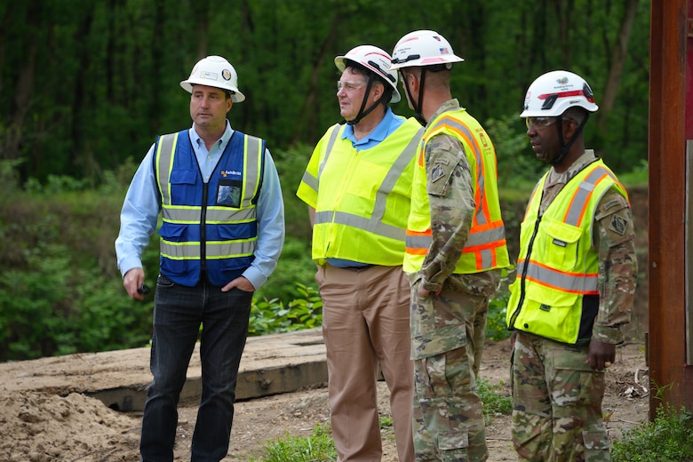 From left to right, Dow Knight, senior vice president for a U.S. Army Corps of Engineers debris removal prime contractor, explains the waterway debris removal process to Acting Assistant Secretary of the Army for Civil Works Lee Forsgren as Col. Brad Morgan, Wilmington District commander, and Maj. Gen. Jason Kelly, deputy commanding general for civil and emergency operations, look on at Hominy Park in Asheville, N.C., April 24, 2025. Forsgren visited western North Carolina to meet with Corps officials, local leaders, and contractors to observe ongoing Hurricane Helene debris removal operations and discuss the mission’s progress.