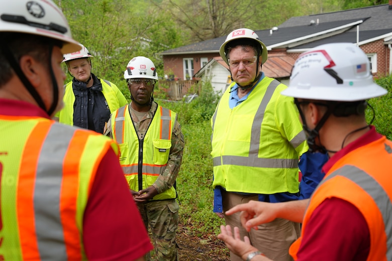 U.S. Army Corps of Engineers Deputy Commanding General for Civil Works Jason Kelly, and Acting Assistant Secretary of the Army for Civil Works, Lee Forsgren, receive an update on private property debris removal progress from USACE officials in McDowell County, North Carolina, April 24, 2025. Kelly and Forsgren visited the region to assess FEMA-funded and state-guided missions being carried out by USACE to help residents recover and rebuild.