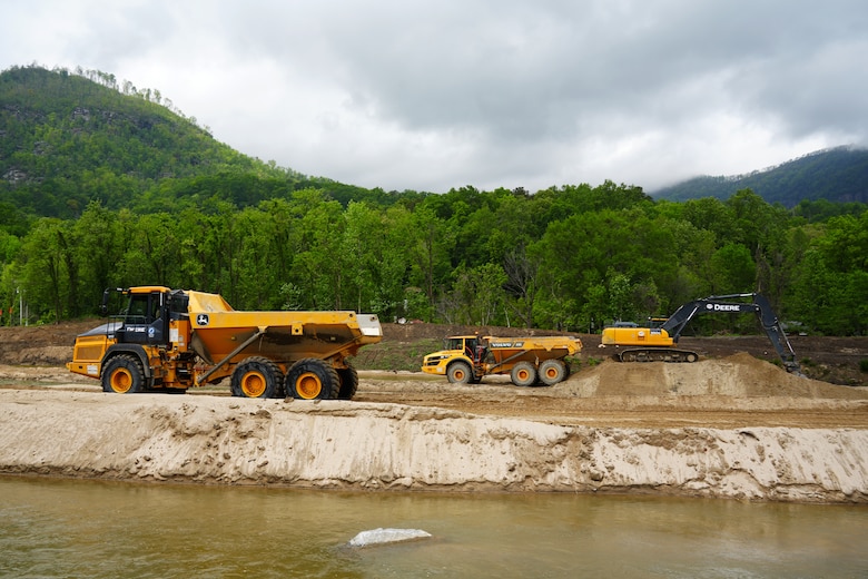 Contractors supporting the U.S. Army Corps of Engineers remove sediment from Lake Lure and the Broad River in support of Hurricane Helene recovery operations in Western North Carolina, April 25, 2025. Using heavy equipment such as excavators and rock trucks, crews are creating a passable waterway for barges to access and remove submerged debris. This sediment removal effort is a key step toward restoring safe conditions for the local community and facilitating long-term recovery.