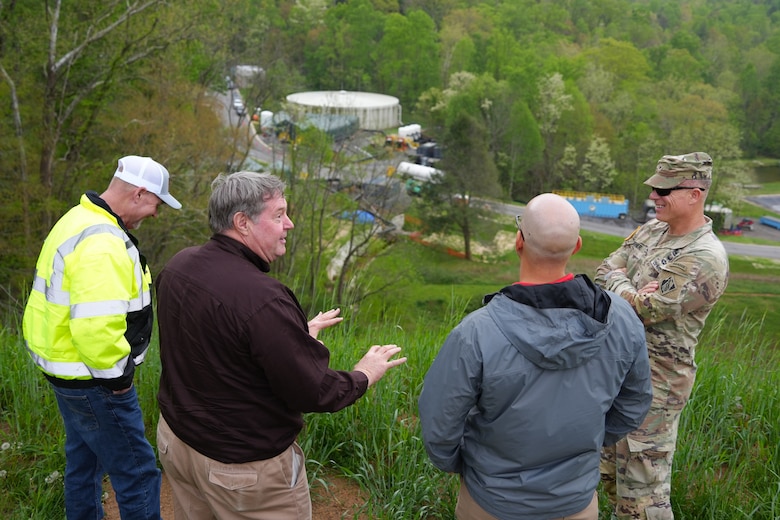 From left to right, U.S. Army Corps of Engineers Quality Assurance lead Chuck Hadley, Acting Assistant Secretary of the Army for Civil Works Lee Forsgren, USACE Water Treatment Plant Project Manager Beau Zeringue, and USACE South Atlantic Division Commander Brig. Gen. Daniel Hibner discuss the water treatment efforts made at the Bee Tree Reservoir in Buncombe County, North Carolina, April 25, 2025. This project was critical to restoring water services for impacted areas after Hurricane Helene.