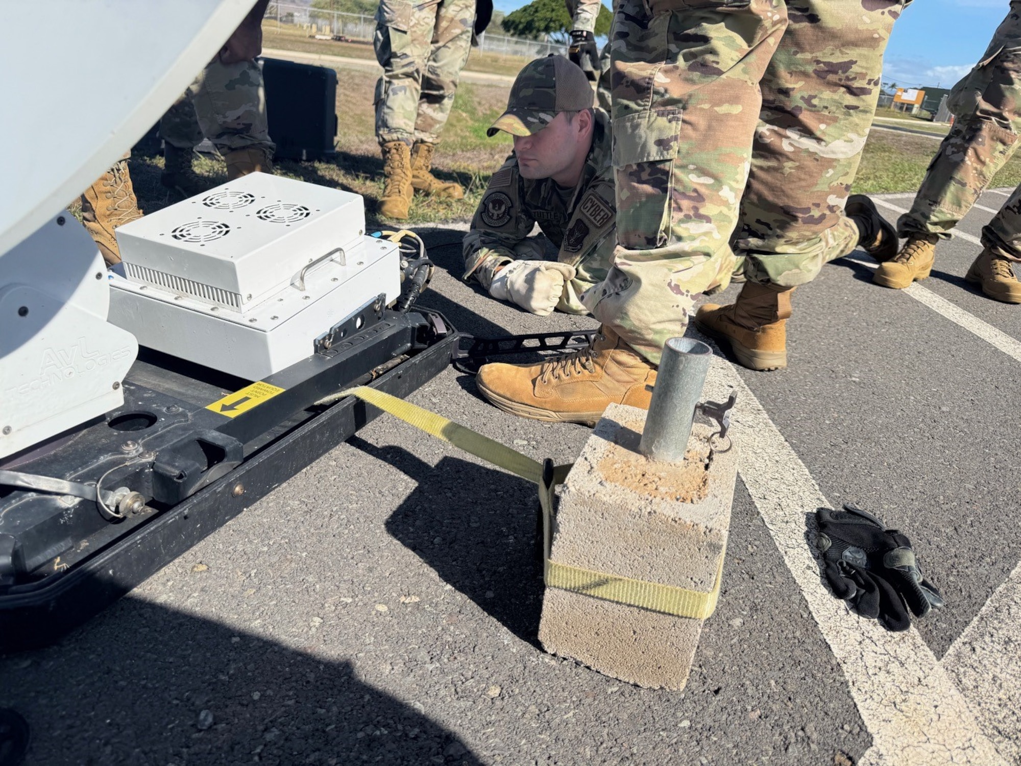Senior Airman Travis Tuttle, 434th Communications Squadron RF systems specialist with, works on a communications system