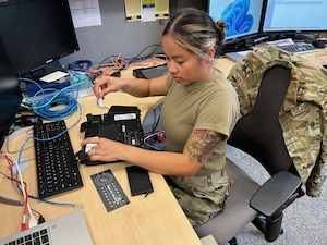 Staff Sgt. Ronalyn Gonzalez, Information Technology specialist with the 434th Communications Squadron, works on a computer at Joint Base Pearl Harbor-Hickam, Hawaii.