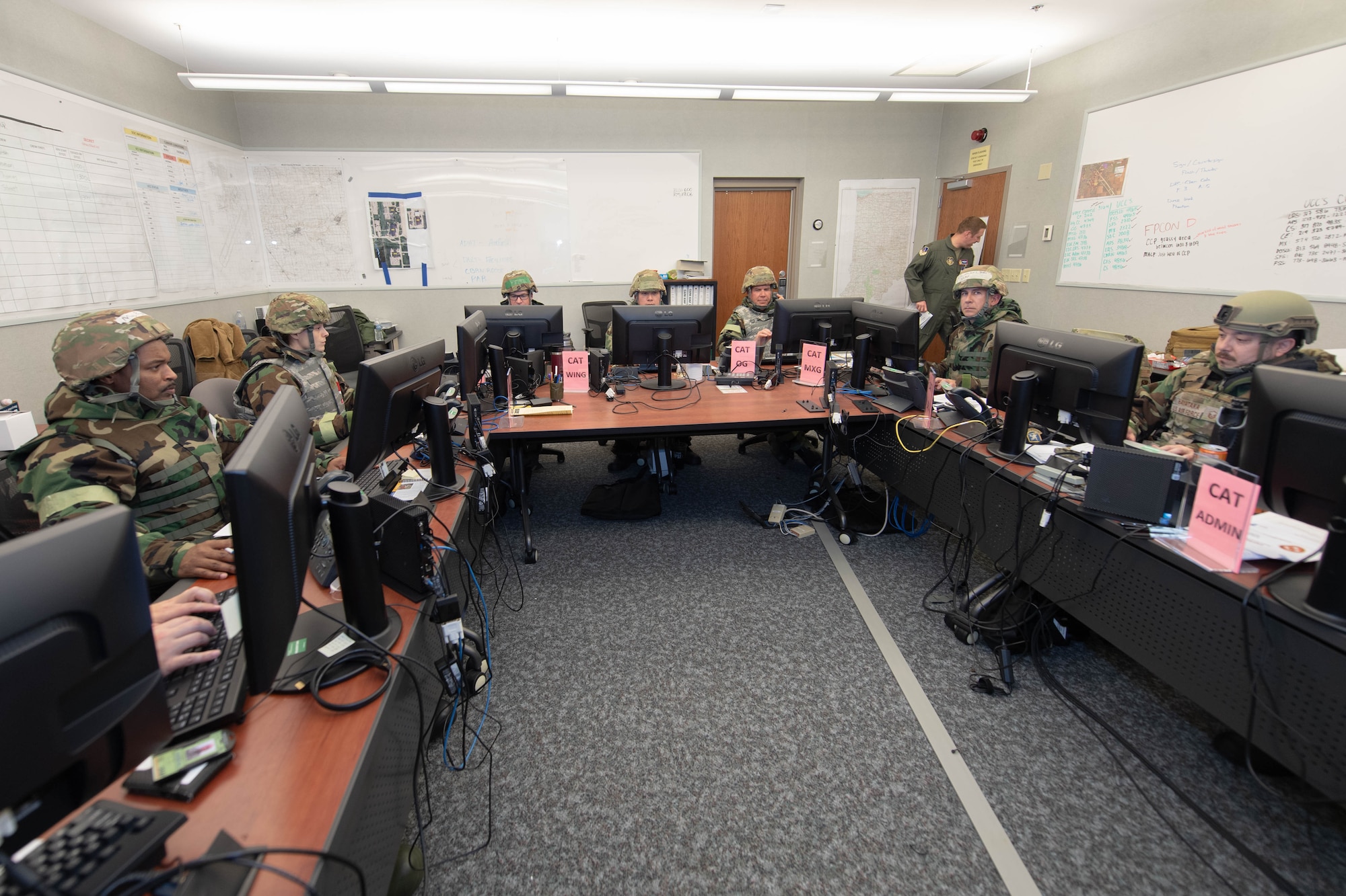 Members of the 434th Air Refueling Wing Crisis Action Team sit at their workstations during exercise Hoosier Dawn