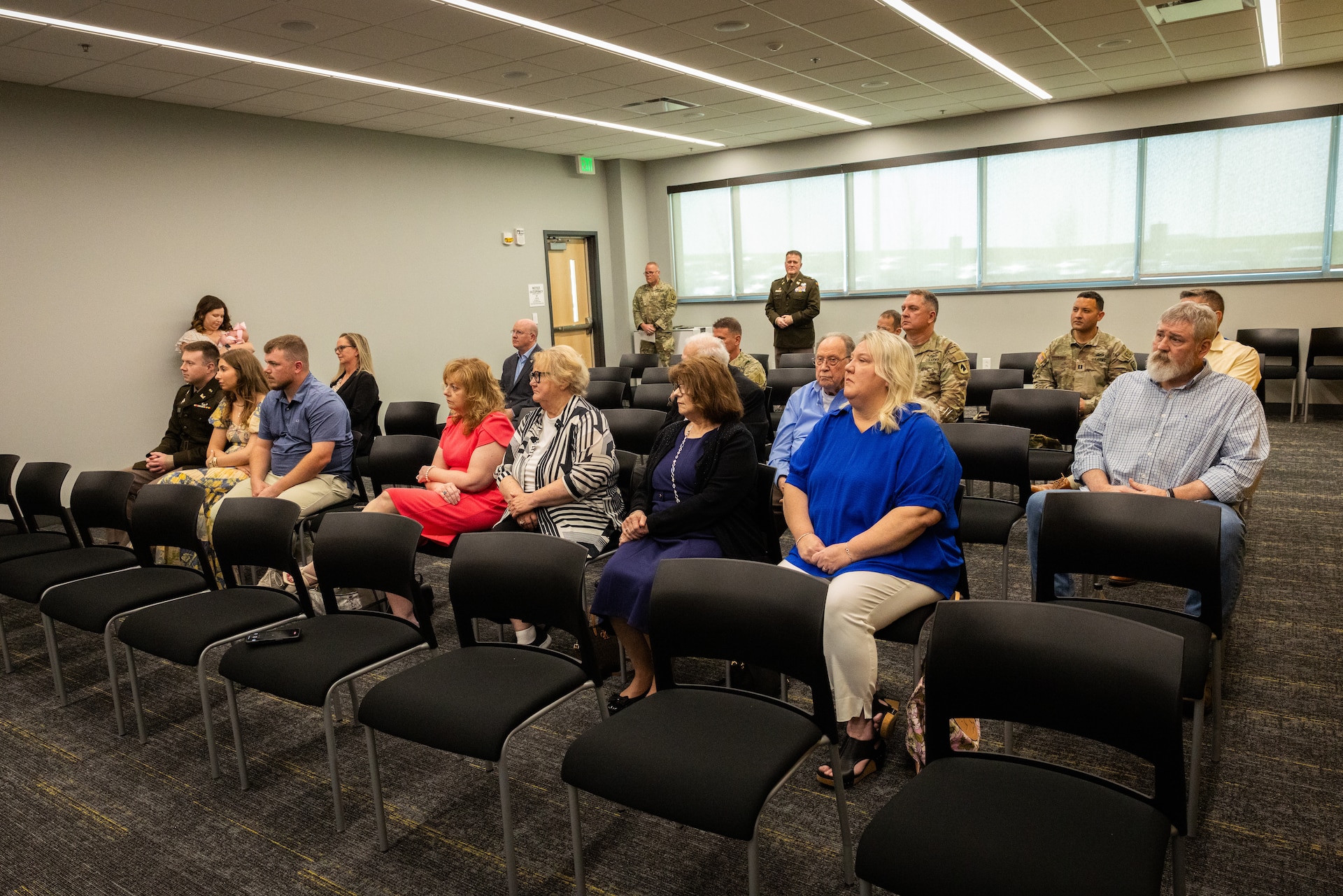 Friends and family of U.S. Army Lt. Col. Shannon Ison gather at Ison’s retirement ceremony at the Joint Forces Headquarters building on Boone National Guard Center in Frankfort, Ky. On April 18, 2025. Ison, a Silver Star recipient, retired after 22 years in a ceremony with friends and family present. (U.S. Army National Guard photo by Andy Dickson)