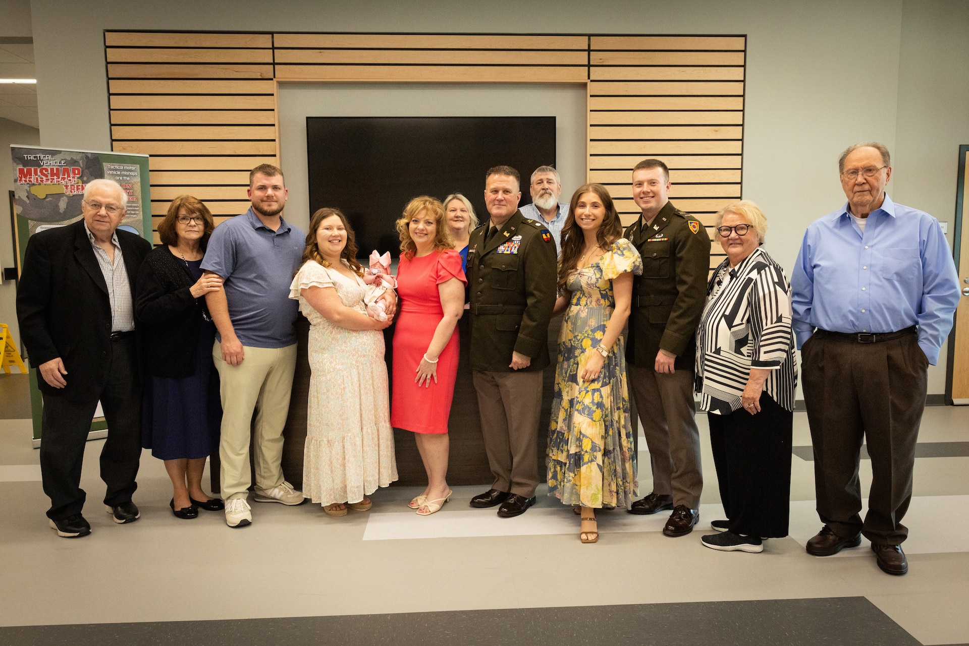 U.S. Army Lt. Col. Shannon Ison (center) with his family at his retirement ceremony at the Joint Forces Headquarters building on Boone National Guard Center in Frankfort, Ky. On April 18, 2025. Ison, a Silver Star recipient, retired after 22 years in a ceremony with friends and family present. (U.S. Army National Guard photo by Andy Dickson)