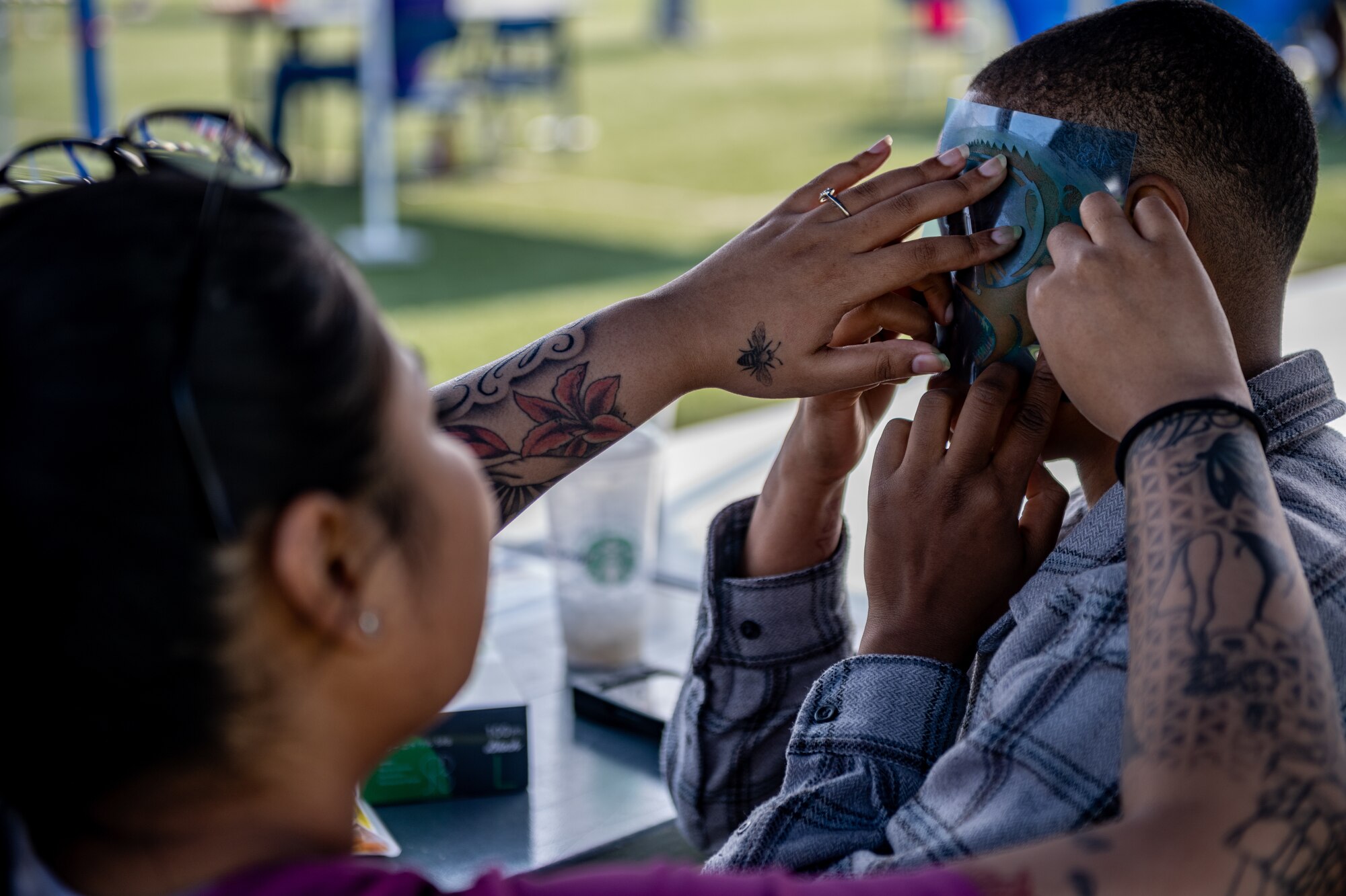 Participant gets their face painted.
