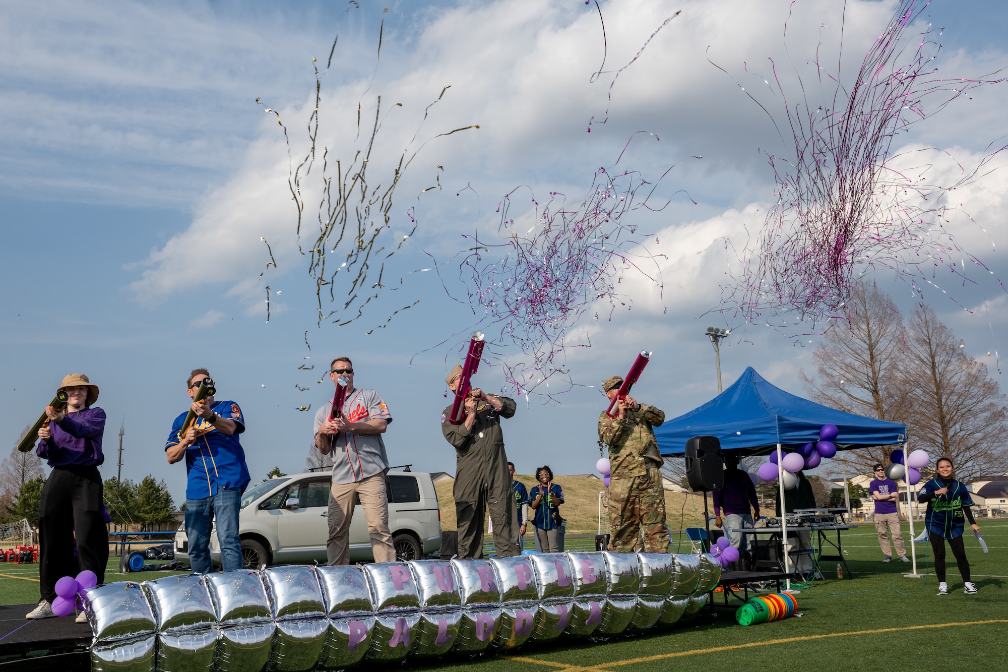 Misawa Air Base leaders set off confetti for the start of the event.