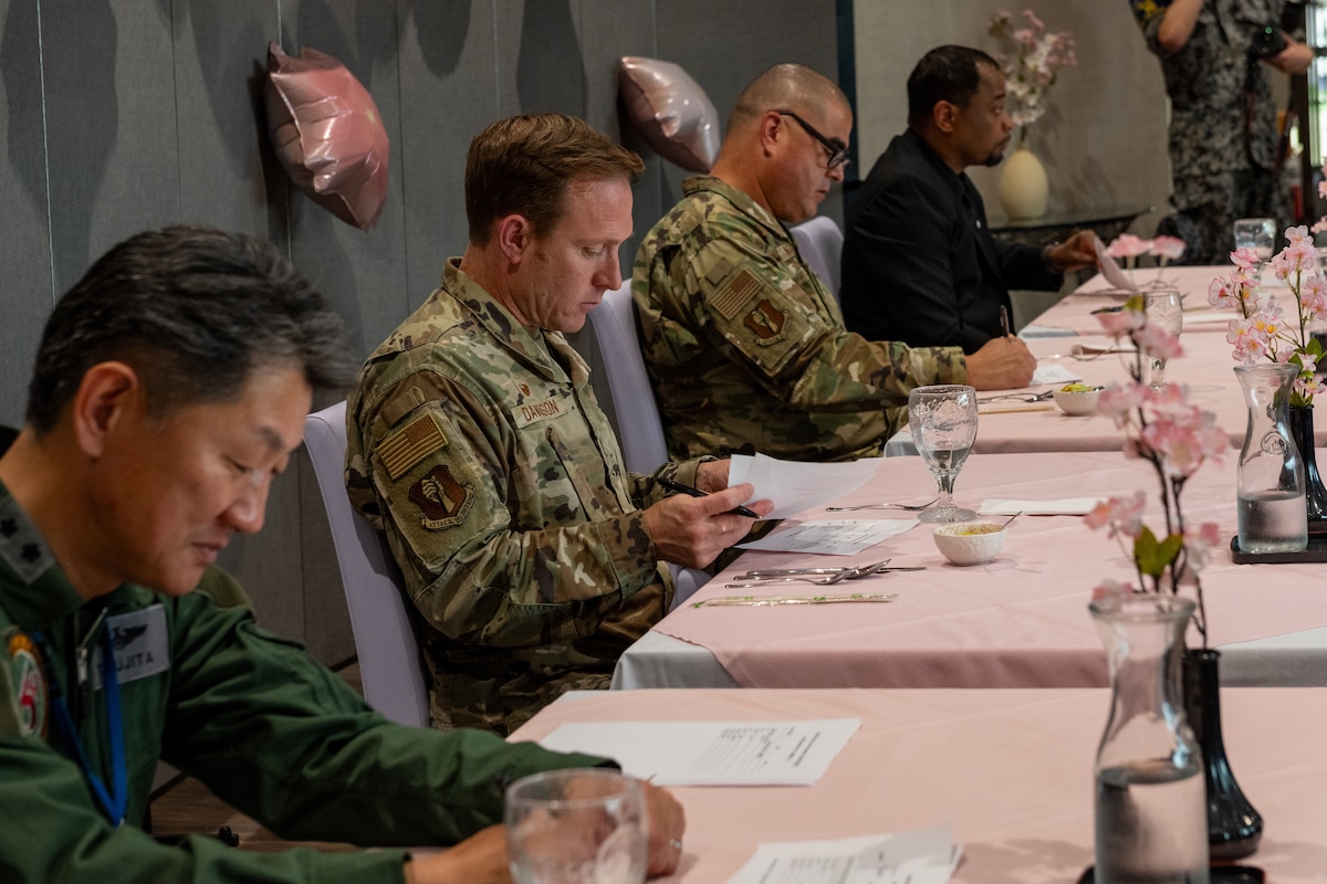 Misawa Air Base leaders judge dishes.