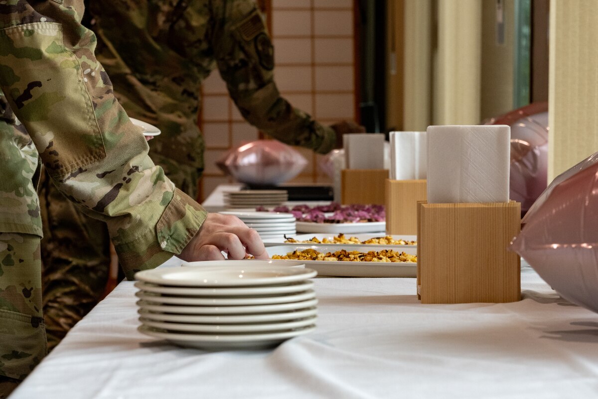 Airmen sample hors d'oeuvres.