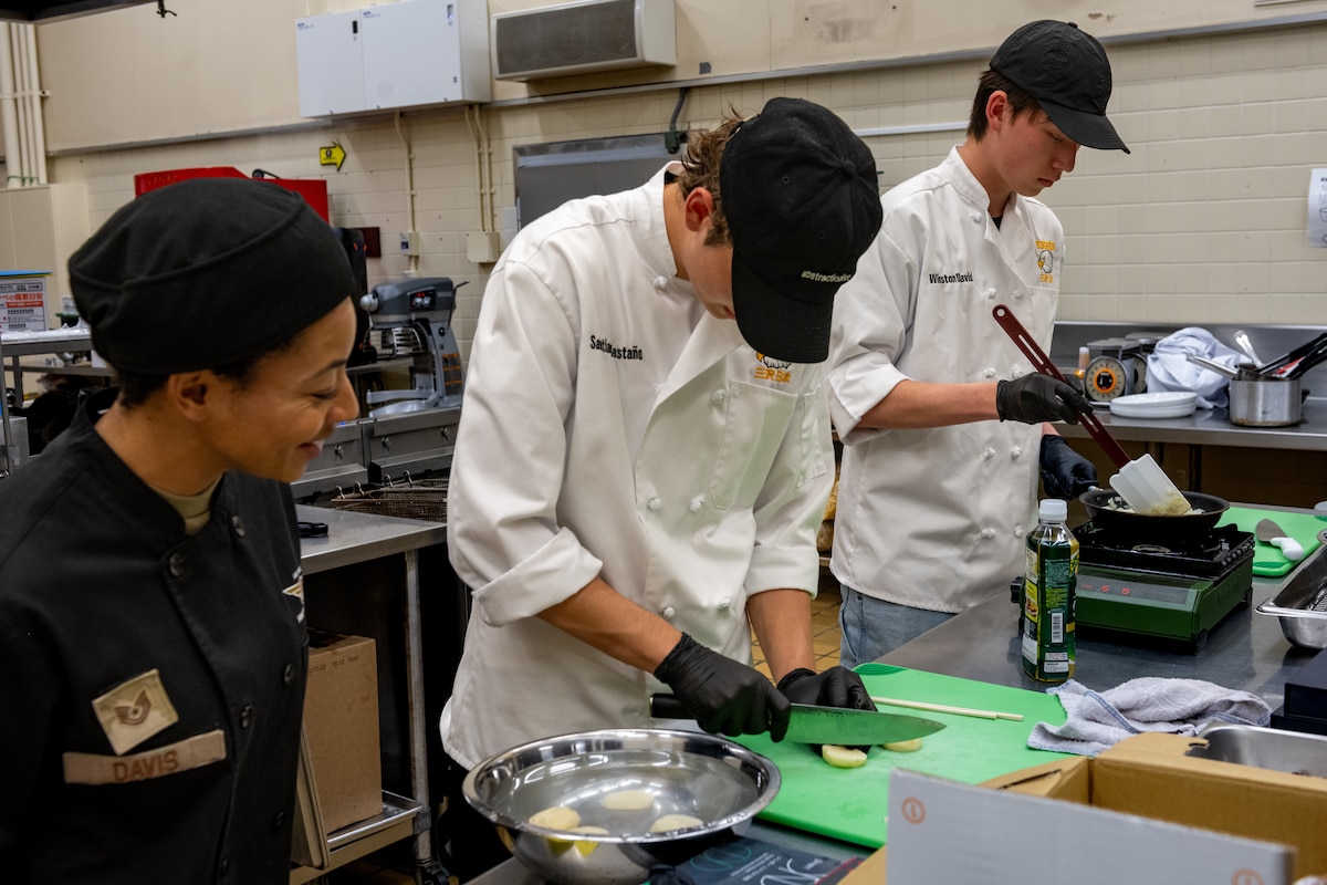 Culinary Club members cook.