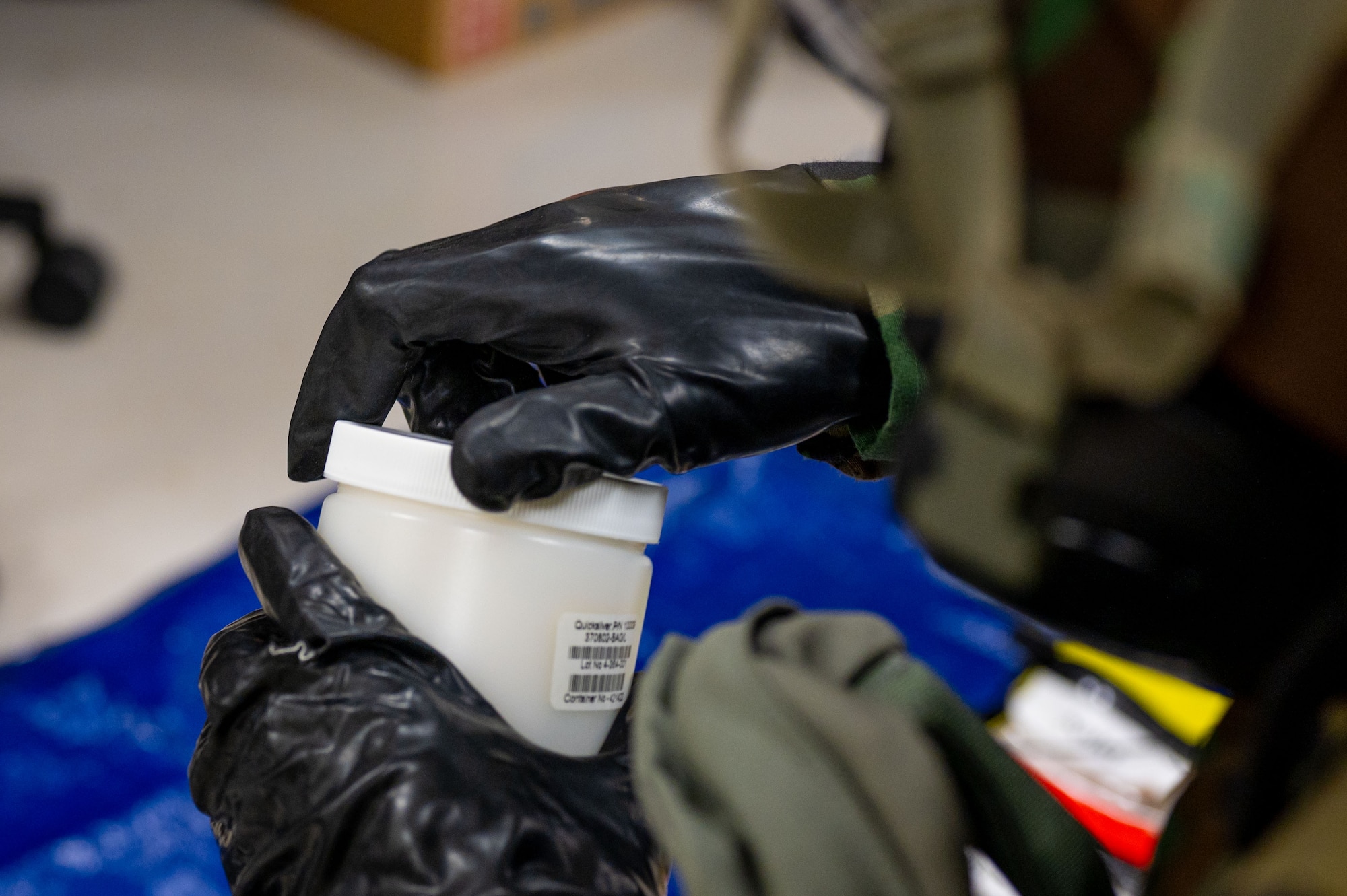 Airmen assigned to the 18th Bioenvironmental Engineering Flight survey the area for a simulated chemical, biological, radiological and nuclear threat in support of a health service medical reserve exercise at Kadena Air Base, Japan, April 17, 2025.