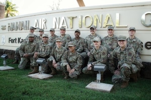 Airmen from the 434th Communications Squadron pose for a group photo at Joint Base Pearl Harbor-Hickam, Hawaii.