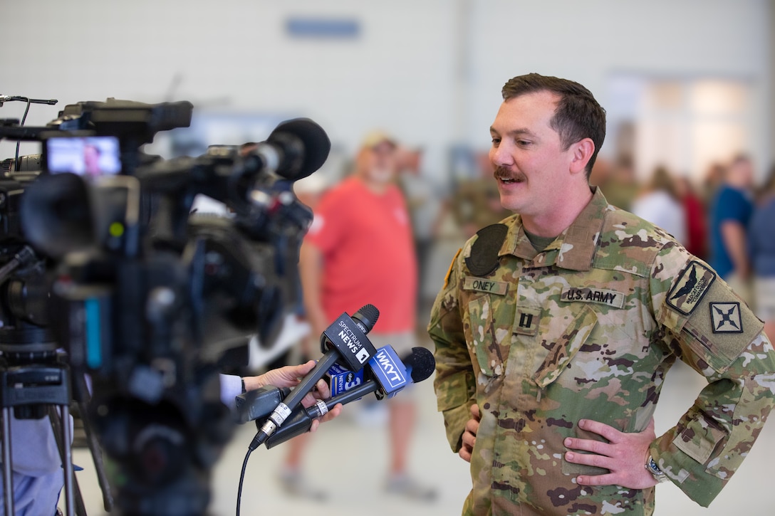 Capt. Corey Oney, 2-238th MEDEVAC commander, speaks with members of the media at the conclusion of the deployment ceremony on April 25, 2025 in Frankfort, Kentucky. Approximately 30 Soldiers from the 2-238th are deploying to Europe in support of intratheater aeromedical evacuations. (U.S. Army National Guard photo by Sgt. First Class Ryan Wilhoit)