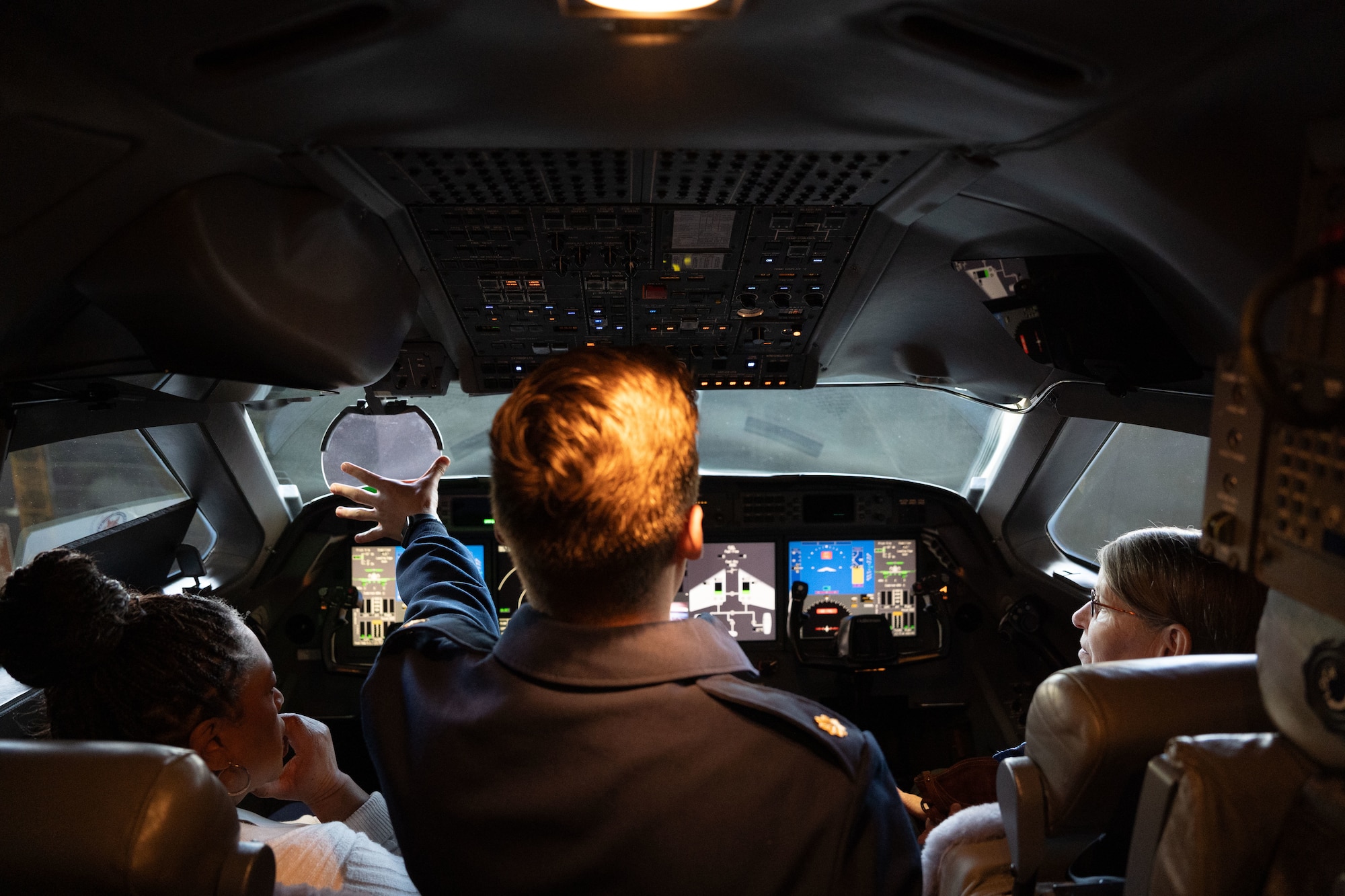 Andrews Ambassadors and Honorary Commanders assigned to various units tour a C-37 aircraft during an Honorary Commander immersion tour of the 89th Airlift Wing at Joint Base Andrews, Maryland, April 8, 2025. Attendees received a one-of-a-kind mission brief, a hands-on virtual reality headset experience walking through our aircraft, and toured a C-37 and C-40 aircraft. (U.S. Air Force photo by Staff Sgt. Gabrielle Winn)