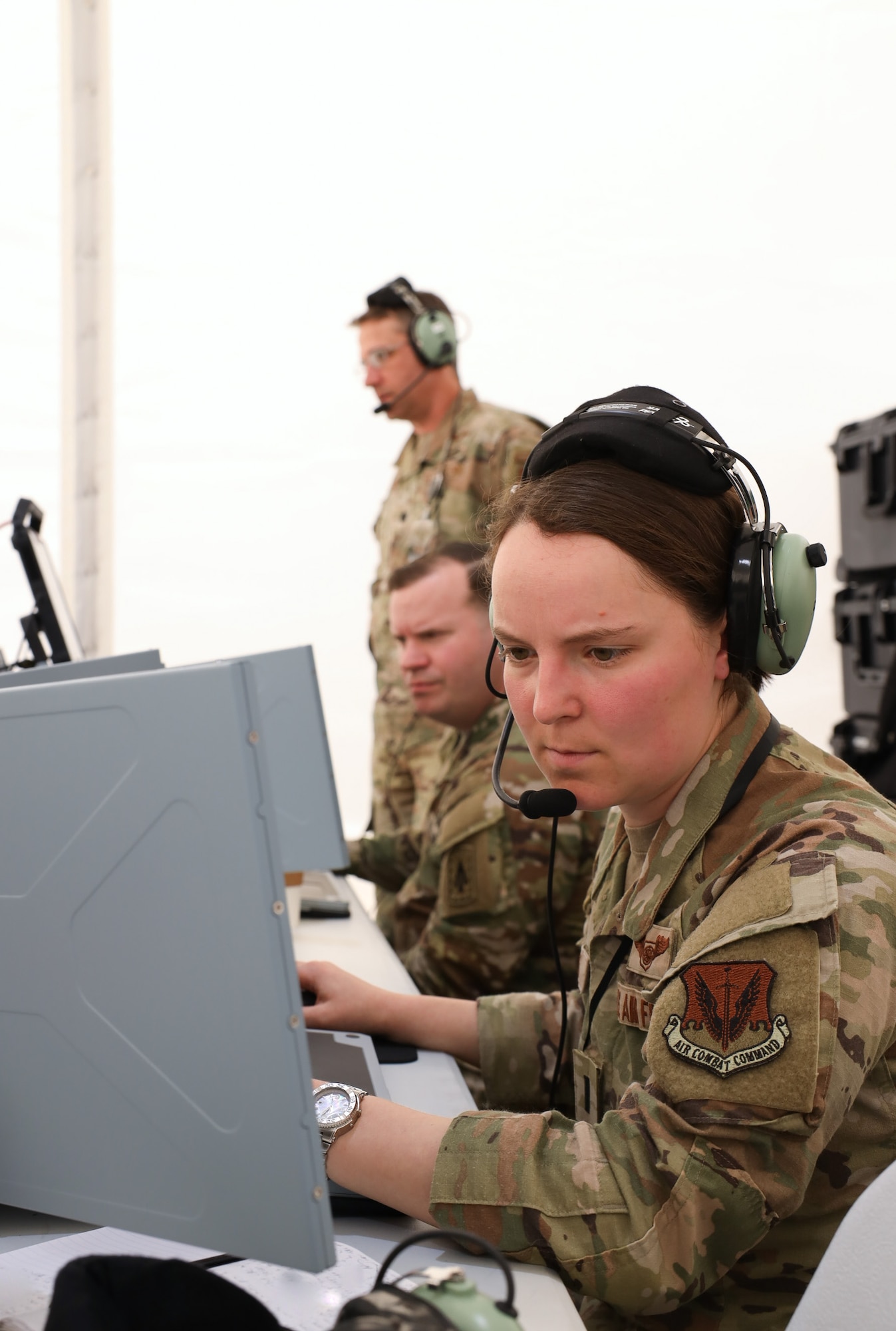 First Lt. Kaitlin Volk, an air battle manager, runs a vul, vulnerability window, during Project Convergence Capstone 5 at the National Training Center, Fort Irwin, California, March 11, 2025. As an air battle manager, Volk acts as an “offensive coordinator” of air combat, strategizing and directing air operations by providing command and control capabilities to air, ground and sea units. (Official Air Force photo by Morgan Brown)