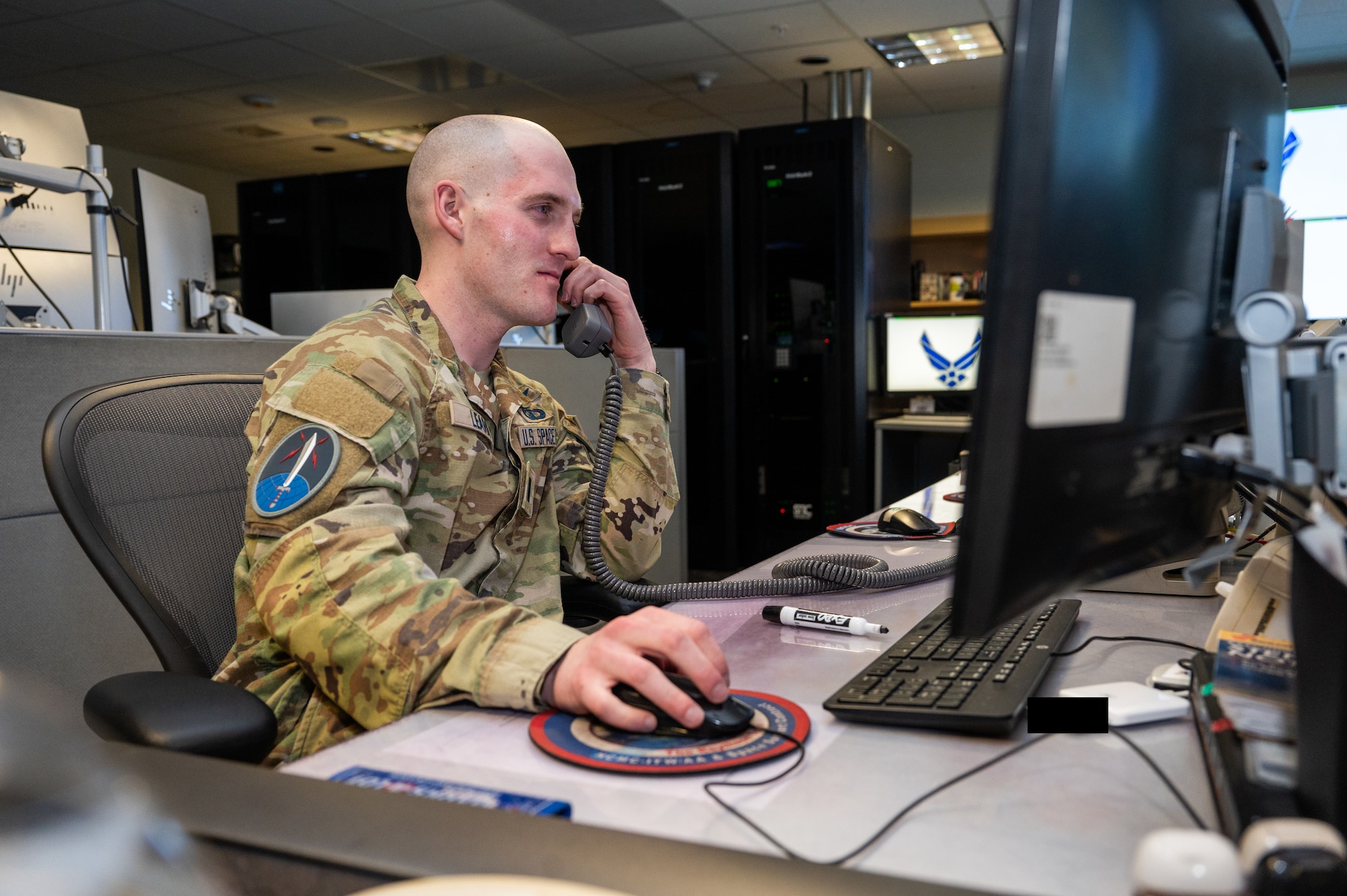 Guardian answers the phone at the Cheyenne Mountain Systems Center