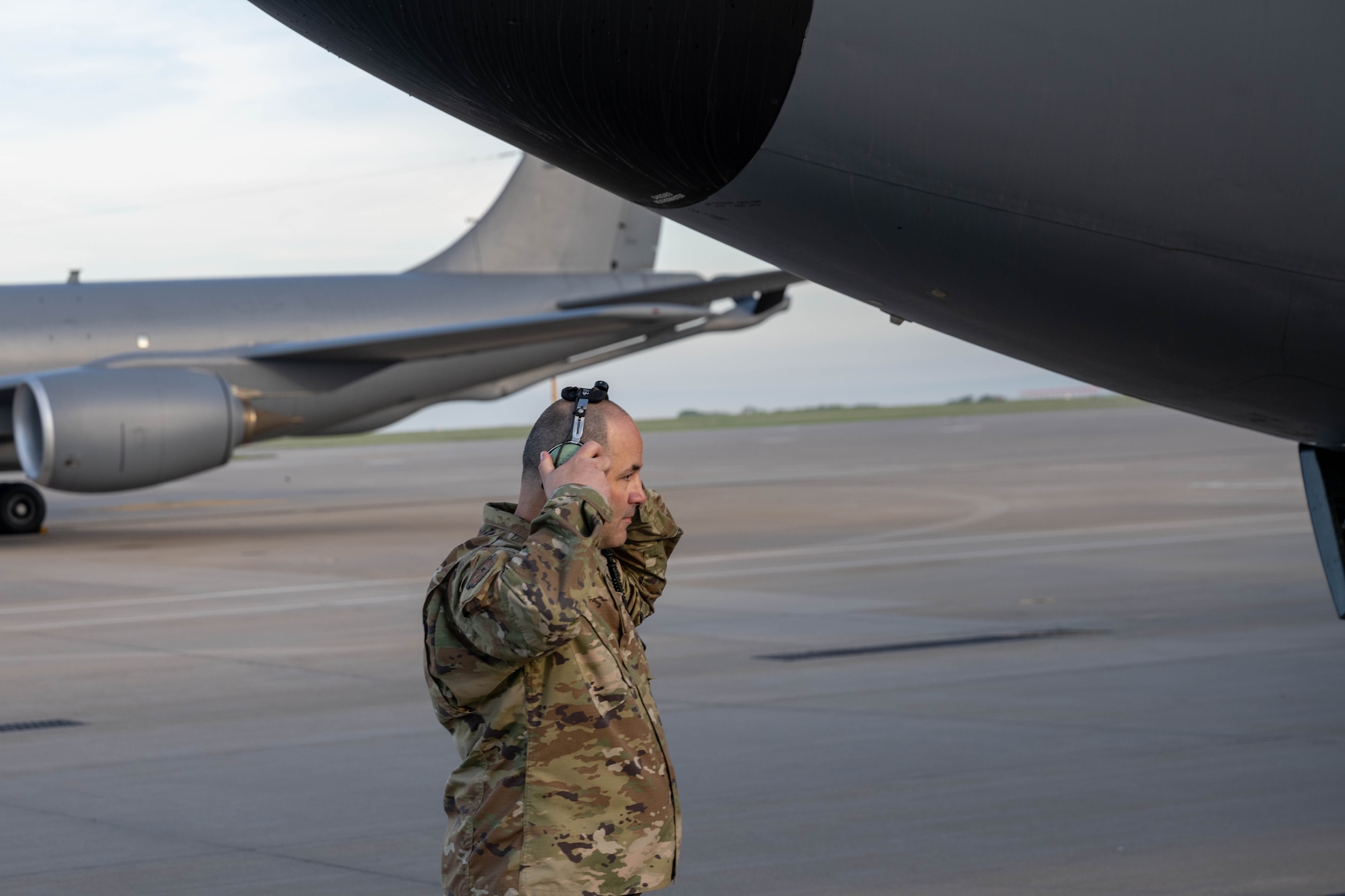 Chief Master Sgt. Craig Webb, 22nd Aircraft Maintenance Squadron aircraft maintenance unit senior enlisted leader, approaches a KC-135 Stratotanker