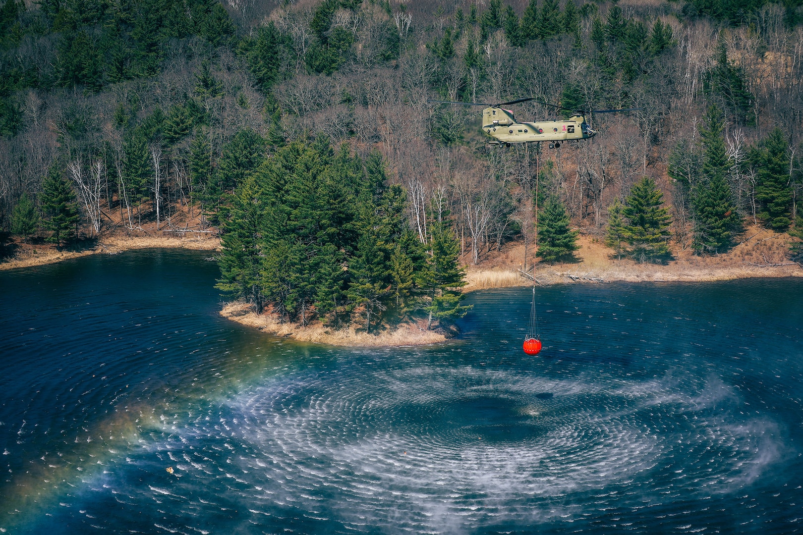 Minnesota National Guard Aviators from the 34th Combat Aviation Brigade conduct their annual Operation Burn Out with the Minnesota Department of Natural Recourses with UH-60 Blackhawk helicopters and CH-47 Chinook Helicopters at Camp Ripley Training Center near Little Falls, Minnesota, on April 16th, 2025.