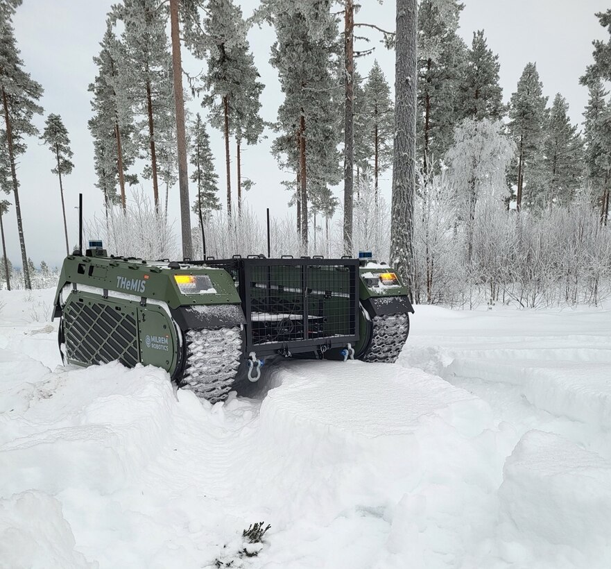 Milrem Robotic’s THeMIS UGV navigating deep snow during a USSOCOM Technical Experimentation held this past winter at Camp Rødsmoen in Rena, Norway. Members of CRREL’s mobility research and development program took part in the TE in order to test the UGV’s capabilities in a variety of terrain and weather and surface conditions. Photo by Mike Parker, CRREL.