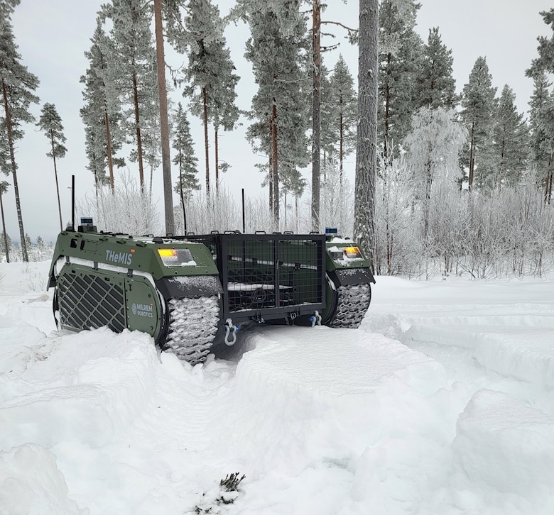 Milrem Robotic’s THeMIS UGV navigating deep snow during a USSOCOM Technical Experimentation held this past winter at Camp Rødsmoen in Rena, Norway. Members of CRREL’s mobility research and development program took part in the TE in order to test the UGV’s capabilities in a variety of terrain and weather and surface conditions. Photo by Mike Parker, CRREL.