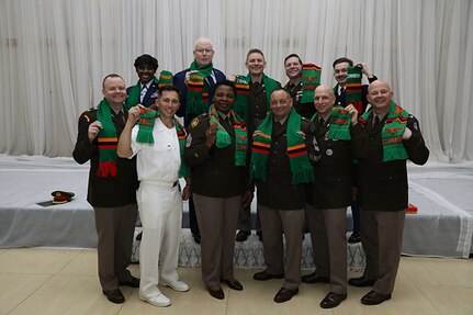 U.S. Military Service Members, attendants of the Southern African Development Community Chaplains Conference, stand together following the conference in Lusaka, Zambia, April 11, 2025.