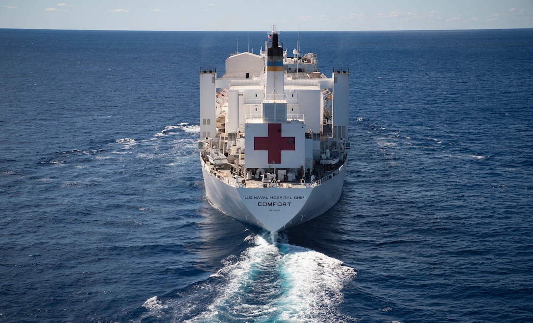 221021-N-MY642-1179

ATLANTIC OCEAN (October 21, 2022) The hospital ship USNS Comfort (T-AH 20) steams through the ocean as part of the transit south from Nofolk, Va. Comfort is deployed to U.S. 4th Fleet in support of Continuing Promise 2022, a humanitarian assistance and goodwill mission conducting direct medical care, expeditionary veterinary care, and subject matter expert exchanges with five partner nations in the Caribbean, Central and South America. (U.S. Navy photo by Mass Communication Specialist 1st Class Donald R. White Jr.)