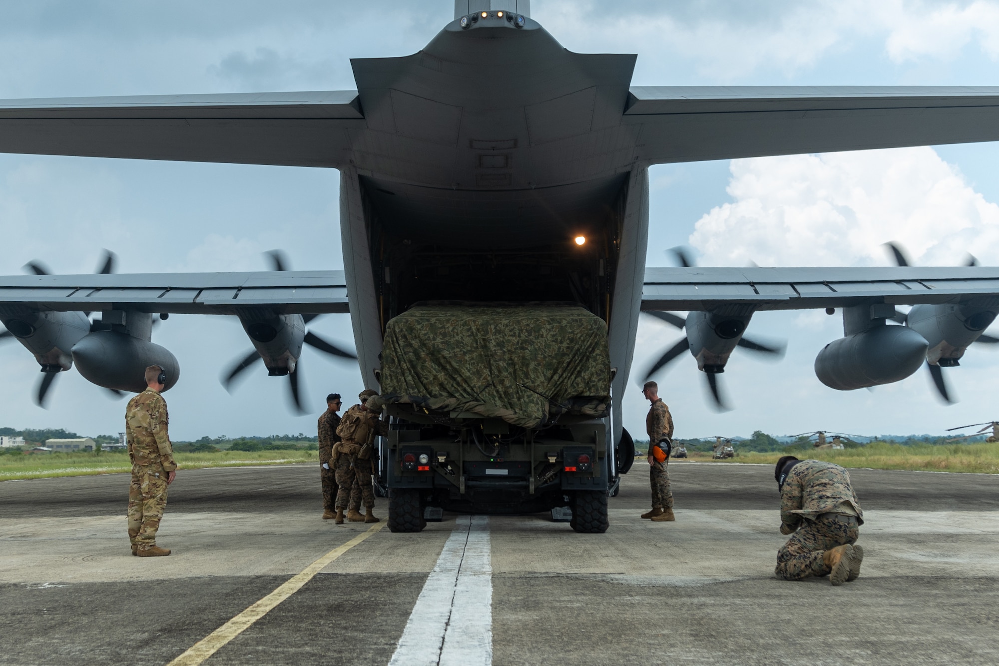 U.S. Marines with Medium-Range Missile Battery, 3d Littoral Combat Team, 3d Marine Littoral Regiment, 3d Marine Division load a Navy-Marine Expeditionary Ship Interdiction System onto a U.S. Air Force C-130J Super Hercules assigned to 39th Airlift Squadron during Exercise Balikatan 25 at Lal-lo, Philippines, April 26, 2025. This marks the inaugural deployment of the newly fielded Marine Corps weapon system to the Philippines and serves as a major milestone for the continuously developing U.S.-Philippines Alliance. Balikatan is a longstanding annual exercise between the Armed Forces of the Philippines and U.S. military designed to strengthen our ironclad alliance, improve our capable combined force, and demonstrate our commitment to regional security and stability. (U.S. Marine Corps photo by Chief Warrant Officer 2 Trent Randolph)
