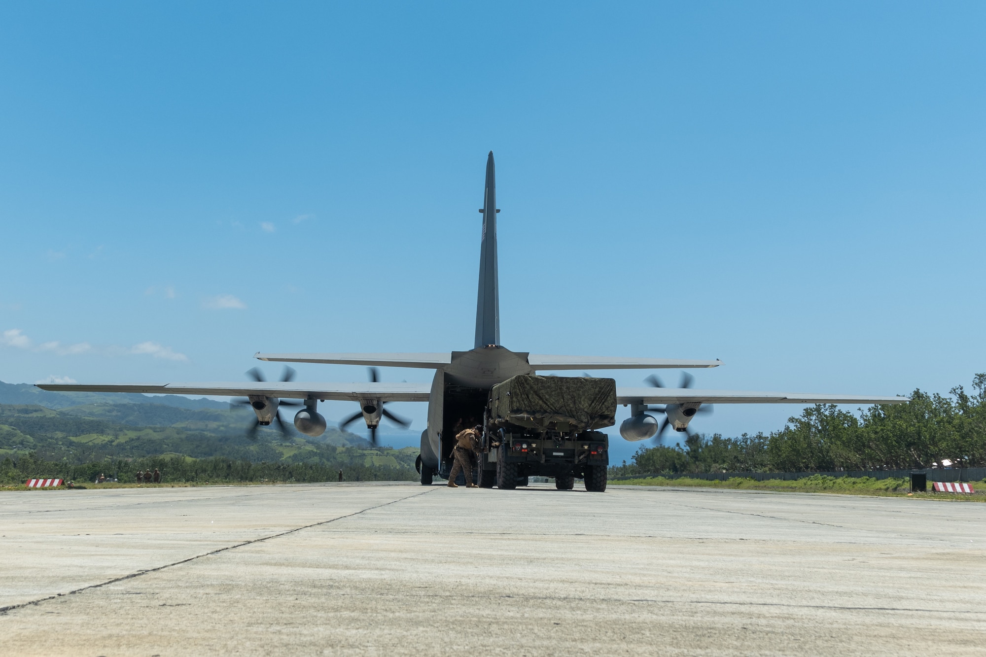 U.S. Marines with Medium-Range Missile Battery, 3d Littoral Combat Team, 3d Marine Littoral Regiment, 3d Marine Division offload a Navy-Marine Expeditionary Ship Interdiction System onto a U.S. Air Force C-130J Super Hercules assigned to 39th Airlift Squadron during Exercise Balikatan 25 at Basco, Philippines, April 26, 2025. This marks the inaugural deployment of the newly fielded Marine Corps weapon system to the Philippines and serves as a major milestone for the continuously developing U.S.-Philippines Alliance. Balikatan is a longstanding annual exercise between the Armed Forces of the Philippines and U.S. military designed to strengthen our ironclad alliance, improve our capable combined force, and demonstrate our commitment to regional security and stability. (U.S. Marine Corps photo by Chief Warrant Officer 2 Trent Randolph)