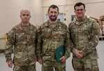 Spc. Brandon Pollard was awarded for his heroic actions helping a driver from her overturned vehicle following a weather-related crash.