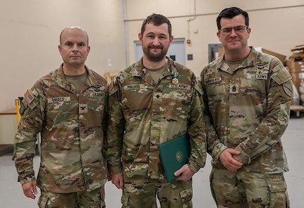 Spc. Brandon Pollard was awarded for his heroic actions helping a driver from her overturned vehicle following a weather-related crash.