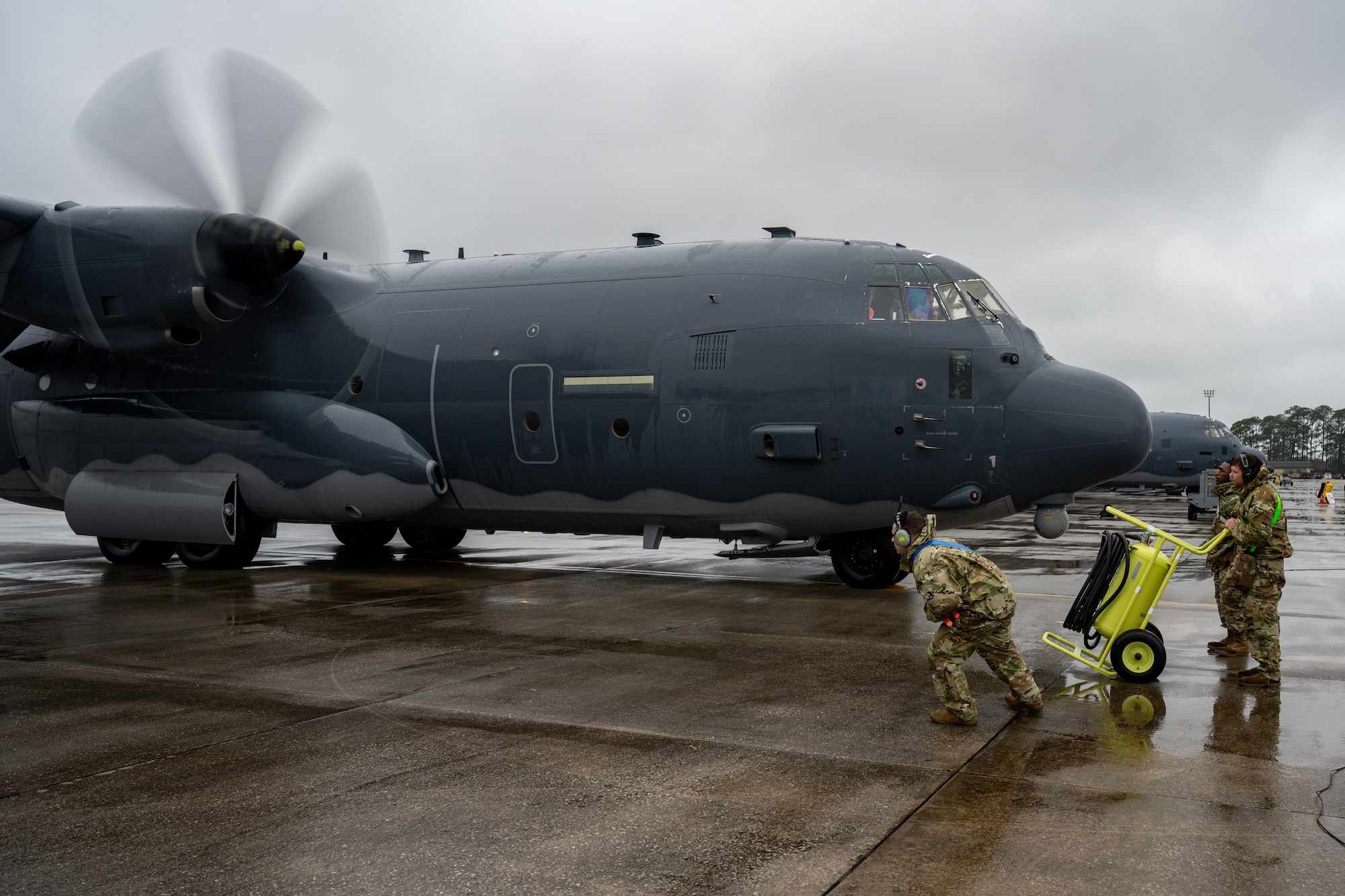 U.S. Air Force maintainers inspect an MC-130J Commando II engine at Hurlburt Field, Florida, Feb. 19, 2025.